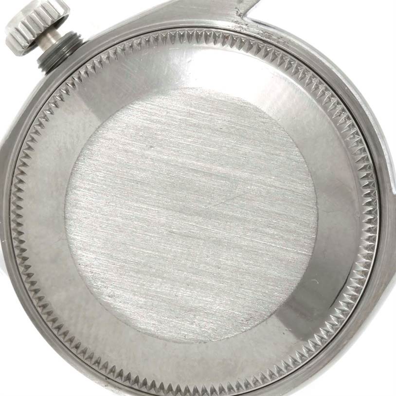 This is a close-up view of the back case and crown of a Rolex Mid-Size 67480 Women's Stainless Steel Black Dial 67480 Women's Stainless Steel Black Dial watch.