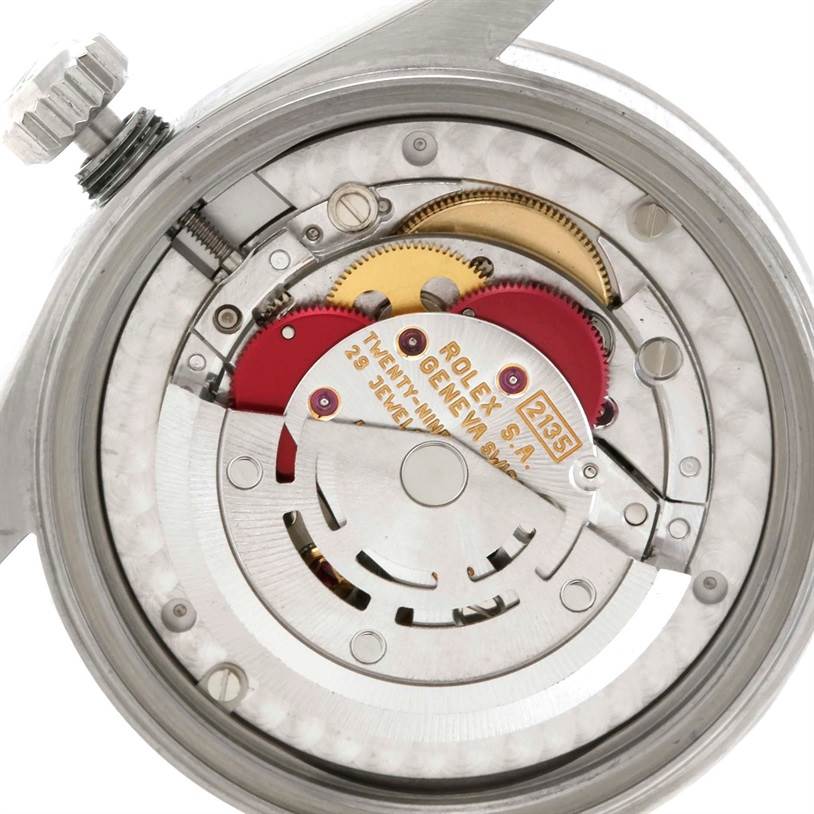 The image shows the internal movement mechanisms of a Mid-Size Rolex watch, viewed from the back.
