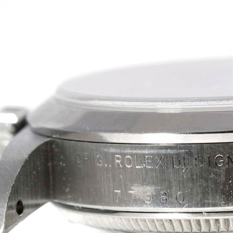 The image shows the side profile of a Mid-Size Rolex watch case, highlighting the engraved model number and the brand name.