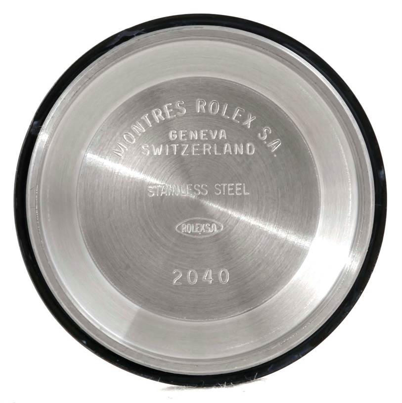 The image shows the back cover of a Rolex Mid-Size 77080 Women's Stainless Steel Pink Dial 77080 Women's Stainless Steel Pink Dial model watch, inscribed with brand details and "2040".