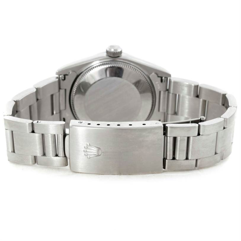 The image shows the back view of a Rolex Mid-Size 77080 Women's Stainless Steel Pink Dial 77080 Women's Stainless Steel Pink Dial model, highlighting the bracelet and clasp.