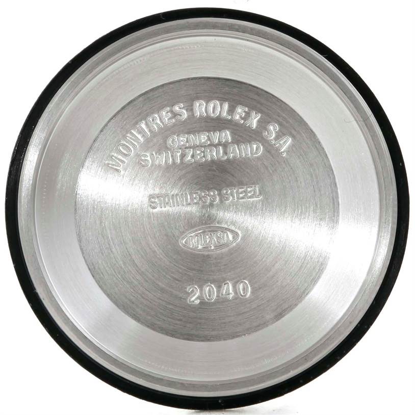 This is the inner view of the back casing of a Mid-Size Rolex watch, indicating "Stainless Steel" and "2040" with "Geneva Switzerland" inscription.