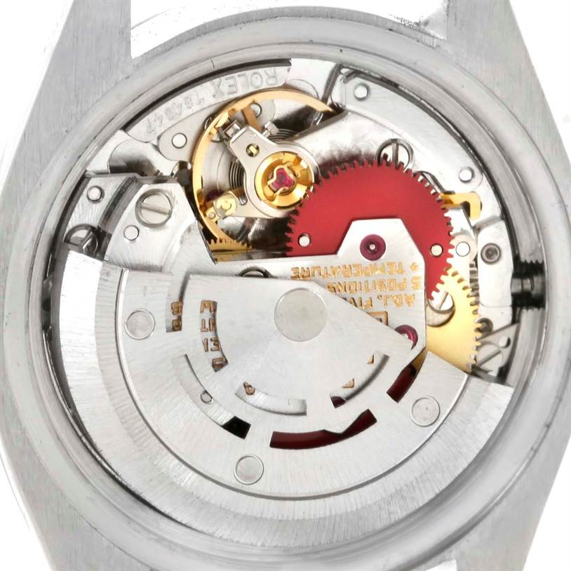 This is an internal view of the Rolex Date 6924 Women's Stainless Steel Silver Dial 6924 Women's Stainless Steel Silver Dial model showcasing its intricate mechanical movement.