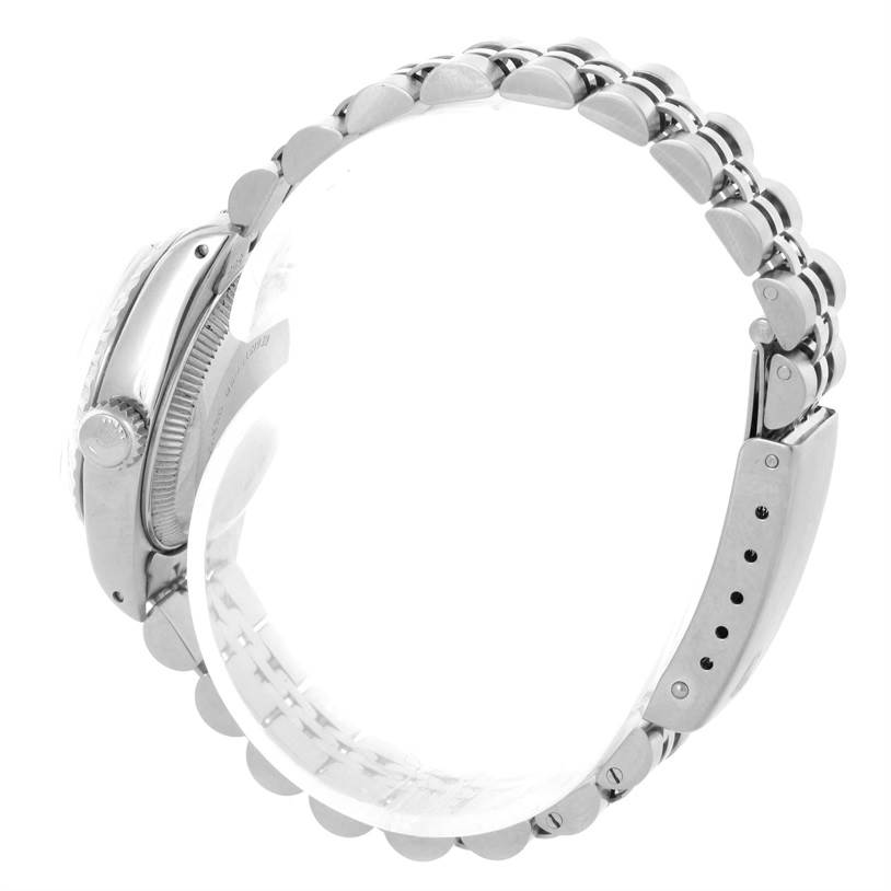 This Rolex Date 6924 Women's Stainless Steel Silver Dial 6924 Women's Stainless Steel Silver Dial watch is shown from a side profile highlighting the case, crown, and bracelet links.