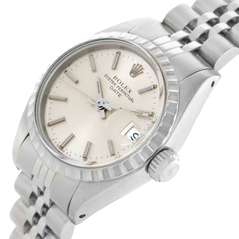 This image shows a Rolex Date 6924 Women's Stainless Steel Silver Dial 6924 Women's Stainless Steel Silver Dial model watch at an oblique angle, highlighting the dial, date window, crown, and partial bracelet.