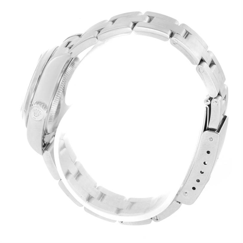This image shows the side and bracelet of the Rolex Date 79160 Women's Stainless Steel White Dial 79160 Women's Stainless Steel White Dial model watch.