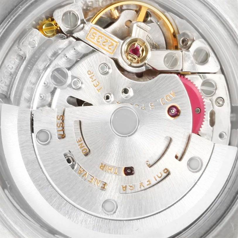 This image shows a close-up view of the intricate movement mechanism inside a Rolex Date 79160 Women's Stainless Steel White Dial 79160 Women's Stainless Steel White Dial watch.
