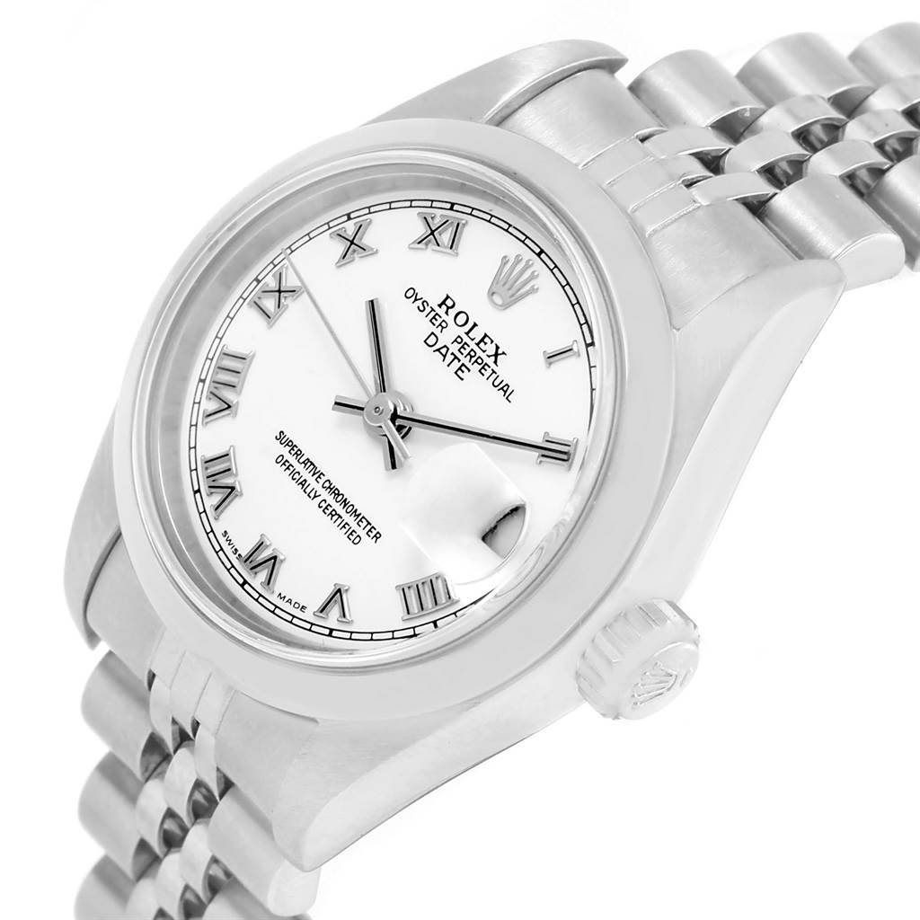 The Rolex Date 79160 Women's Stainless Steel White Dial 79160 Women's Stainless Steel White Dial model watch is shown at an oblique angle, displaying its white dial, crown, and partial bracelet.