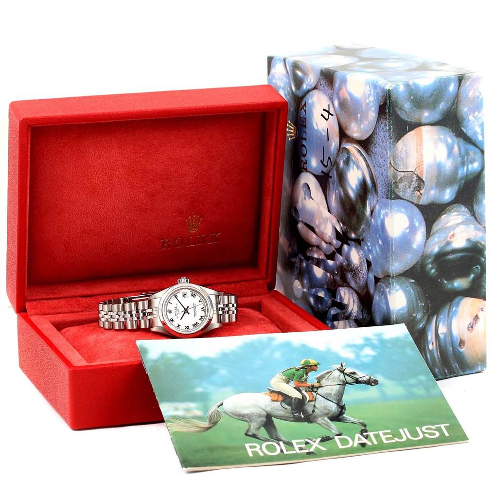 The image shows a Rolex Date 79160 Women's Stainless Steel White Dial 79160 Women's Stainless Steel White Dial model watch in an open red box, with a Rolex Date 79160 Women's Stainless Steel White Dial 79160 Women's Stainless Steel White Dialjust booklet and the outer box next to it.