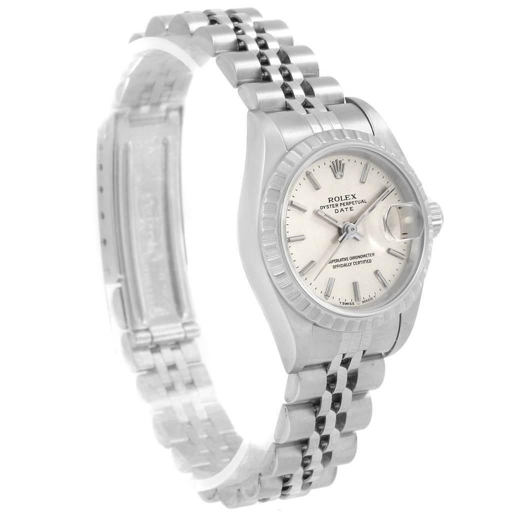 The image shows a side angle of a Rolex Date 69240 Women's Stainless Steel Silver Dial 69240 Women's Stainless Steel Silver Dial model watch focusing on the dial, bezel, and bracelet.