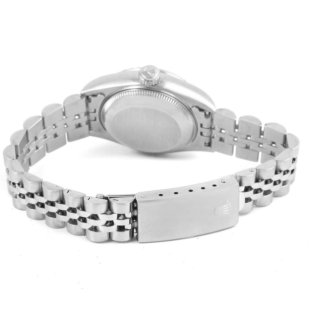 The image shows a side and rear view of a Rolex Date 69240 Women's Stainless Steel Silver Dial 69240 Women's Stainless Steel Silver Dial model watch, highlighting the case back and bracelet clasp.