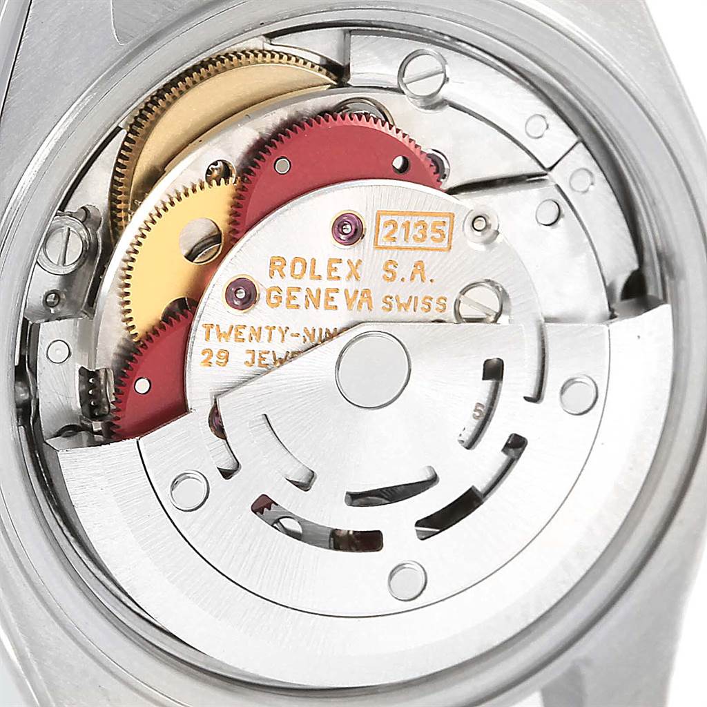 The image shows an internal view of the movement mechanism of a Rolex Date 69160 Women's Stainless Steel White Dial 69160 Women's Stainless Steel White Dial model watch at a close-up angle.