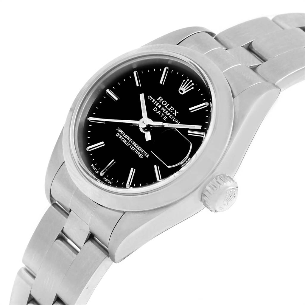 The image shows a Rolex Date 79160 Women's Stainless Steel Black Dial 79160 Women's Stainless Steel Black Dial model watch at a tilted angle, displaying the face, crown, and part of the bracelet.