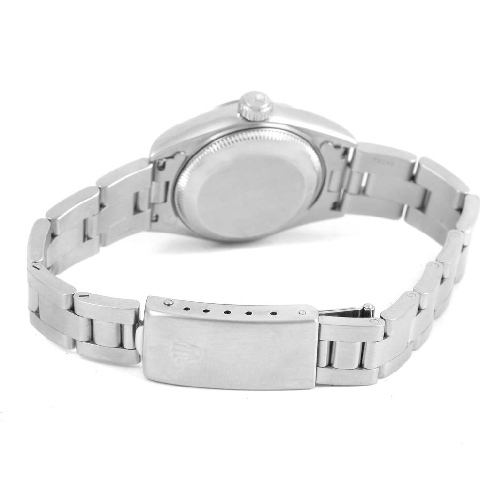 This image shows the back of the Rolex Date 79160 Women's Stainless Steel Black Dial 79160 Women's Stainless Steel Black Dial watch, featuring its case back and metal bracelet with clasp.