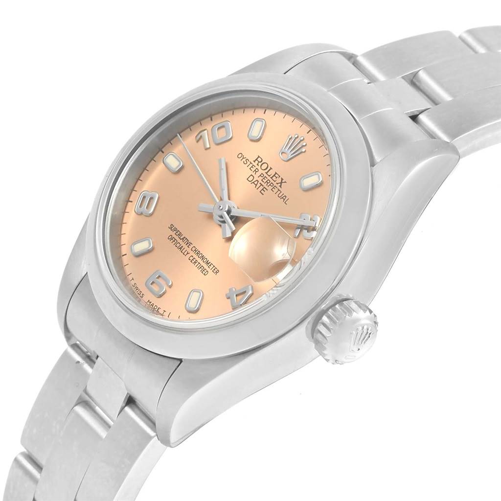 The image shows a close-up angled view of a Rolex Oyster Perpetual Date watch, displaying the dial, crown, and bracelet.