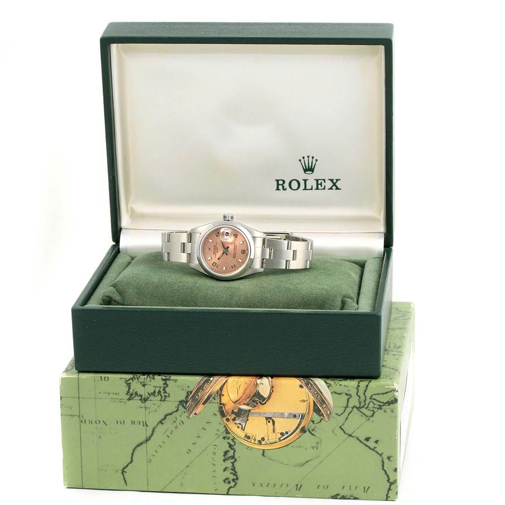 The Rolex Date 69160 Women's Stainless Steel Pink Dial 69160 Women's Stainless Steel Pink Dial watch is shown at a front angle in its open box, highlighting the dial, case, and bracelet.