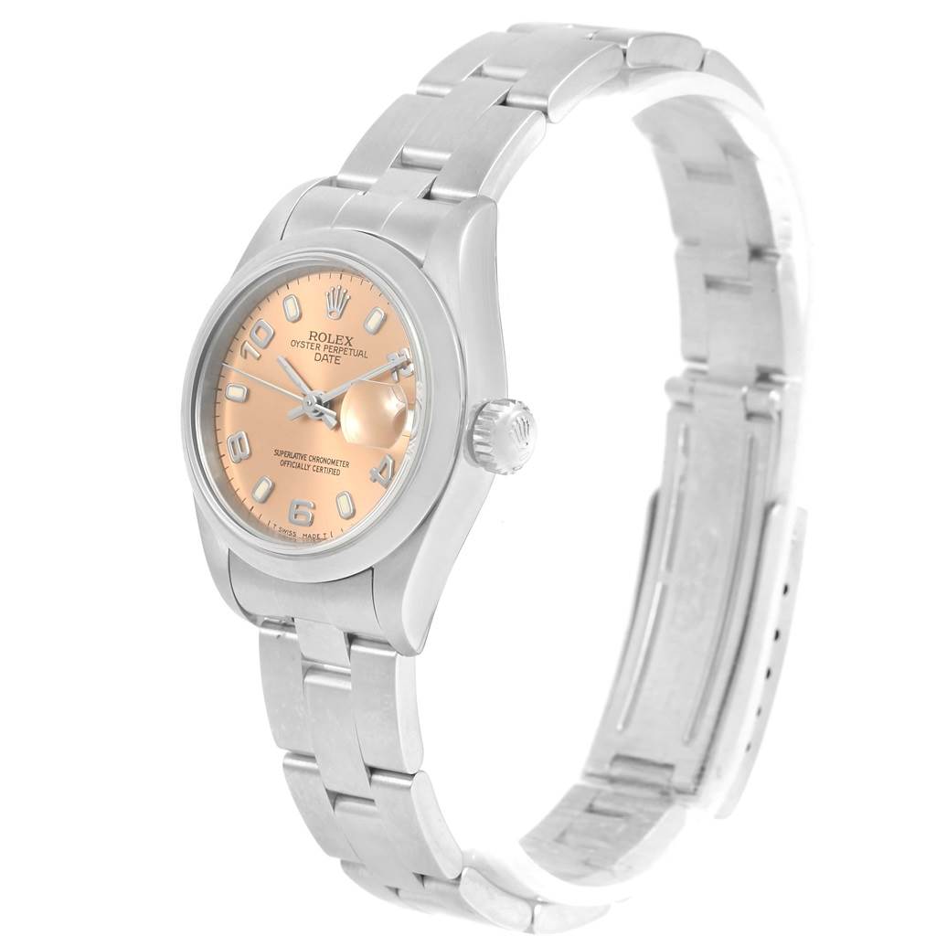 The image shows a Rolex Date 69160 Women's Stainless Steel Pink Dial 69160 Women's Stainless Steel Pink Dial model watch at an angle displaying the face, crown, bezel, and partially open bracelet.