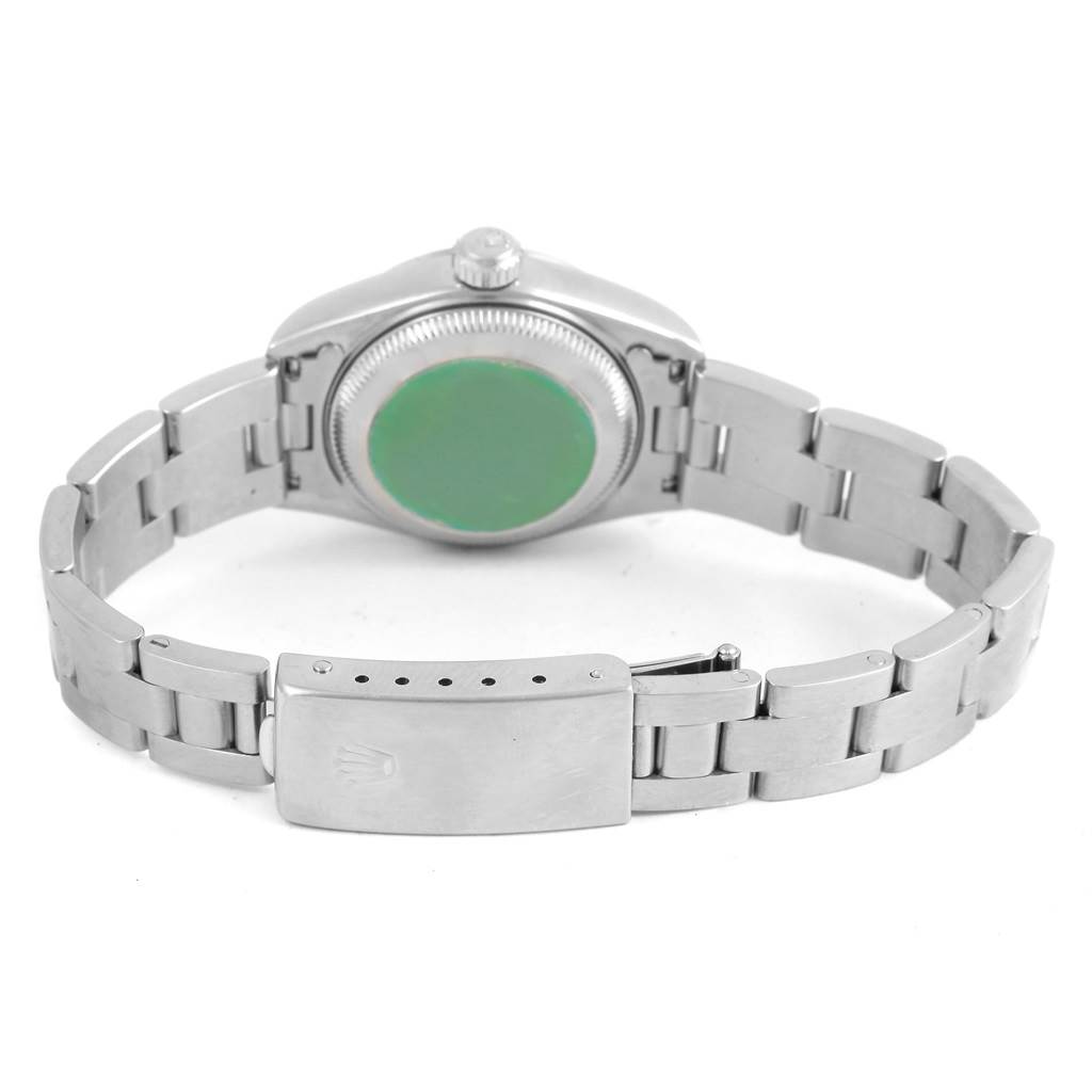 The image shows the back case, crown, and metal bracelet with clasp of a Rolex Date 69160 Women's Stainless Steel Pink Dial 69160 Women's Stainless Steel Pink Dial model watch.