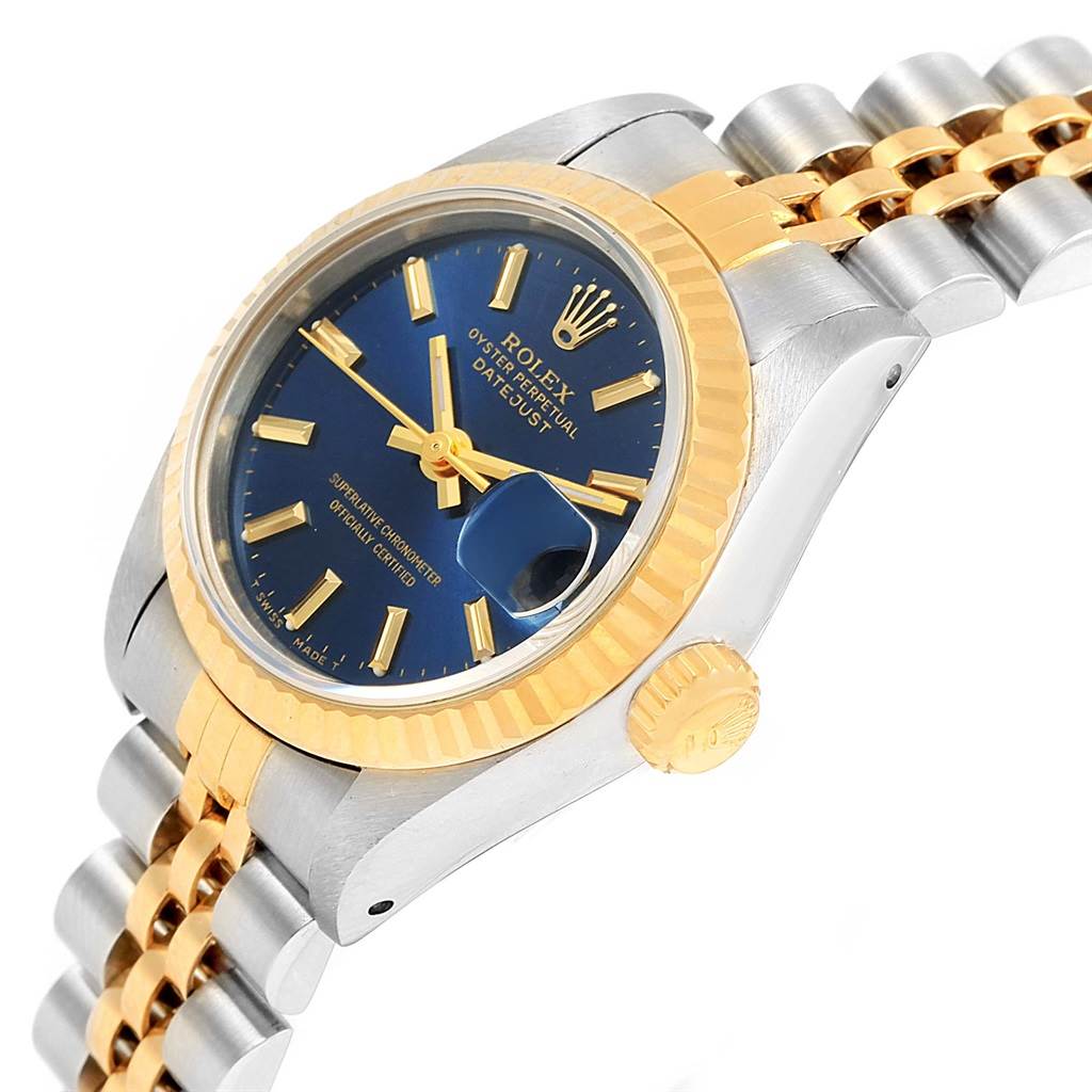 This image shows a side angle of the Rolex Date 69173 Women's Stainless Steel Blue Dial 69173 Women's Stainless Steel Blue Dial model, highlighting the crown, bezel, face, and part of the band.