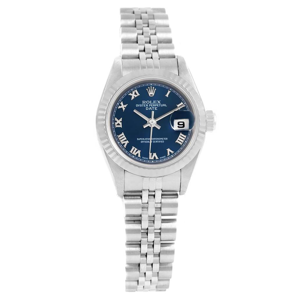 This Rolex Date 79174 Women's Stainless Steel Blue Dial 79174 Women's Stainless Steel Blue Dial watch is shown from a front angle, highlighting its blue dial, Roman numerals, date window, and stainless steel bracelet.
