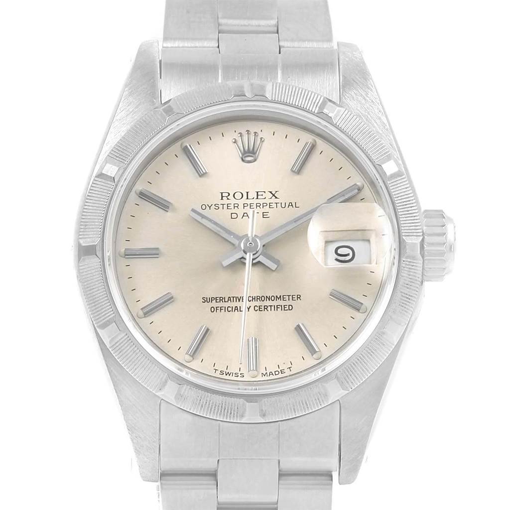 This image shows the face and bracelet of a Rolex Oyster Perpetual Date model watch from a front angle.