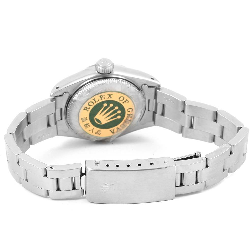 The image shows the backside and bracelet clasp of a Rolex Date 69190 Women's Stainless Steel Silver Dial 69190 Women's Stainless Steel Silver Dial model watch, including the screw-down case back and folding clasp.