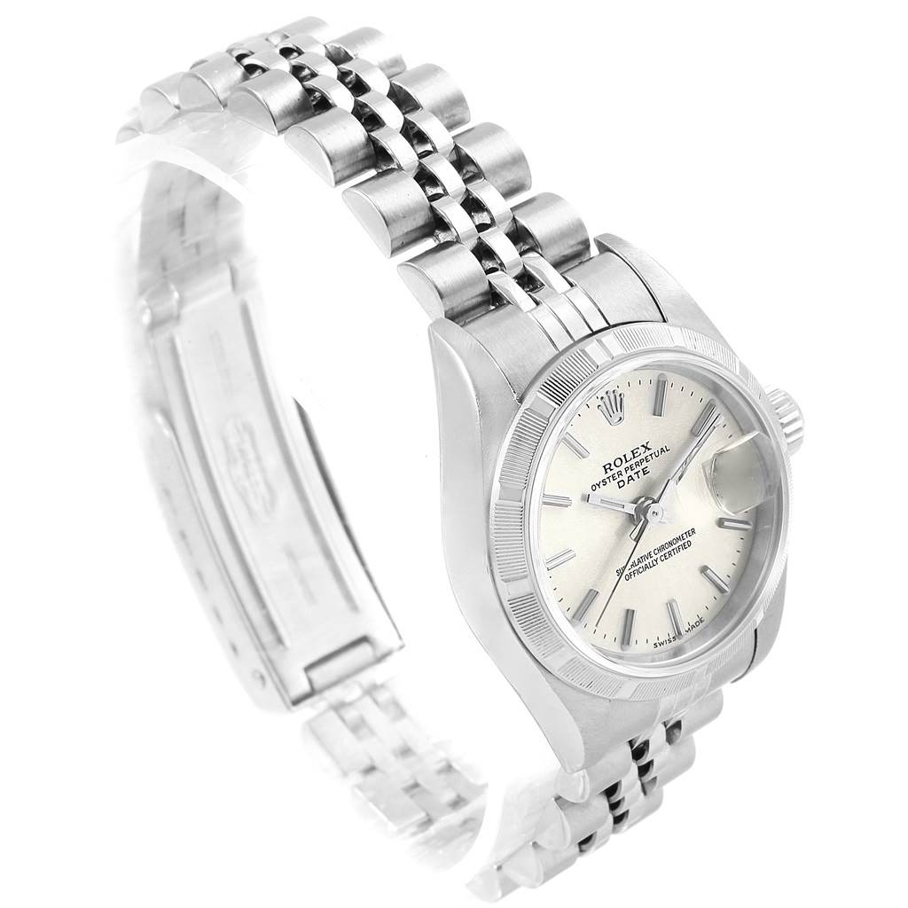The image shows a side angle of a Rolex Date 79190 Women's Stainless Steel Silver Dial 79190 Women's Stainless Steel Silver Dial watch, highlighting the dial, bezel, and the Jubilee bracelet.