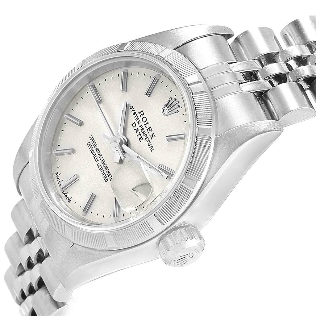 The Rolex Date 79190 Women's Stainless Steel Silver Dial 79190 Women's Stainless Steel Silver Dial model watch is shown at an angled close-up, highlighting the dial, bezel, crown, and part of the bracelet.