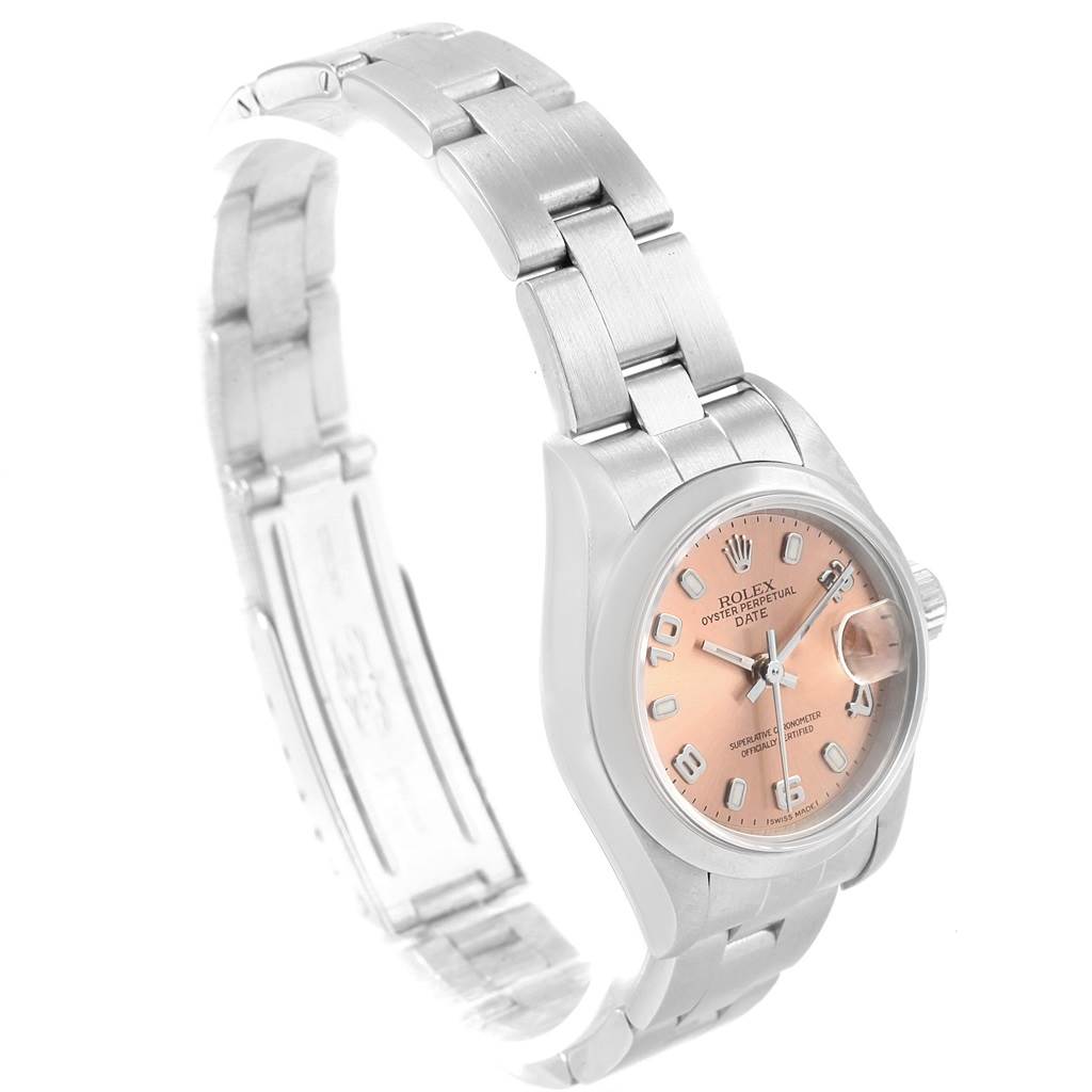 The image shows a side-angle view of a Rolex Date 79160 Women's Stainless Steel Pink Dial 79160 Women's Stainless Steel Pink Dial model watch, highlighting its face, crown, and metal bracelet.