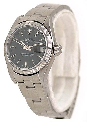 The image shows a left-side angle view of the Rolex Date 79190 Women's Stainless Steel Black Dial 79190 Women's Stainless Steel Black Dial watch, highlighting the face, bezel, crown, and part of the bracelet.