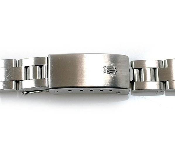 This image shows the clasp and part of the stainless steel bracelet of a Rolex Date 79190 Women's Stainless Steel Black Dial 79190 Women's Stainless Steel Black Dial model watch.