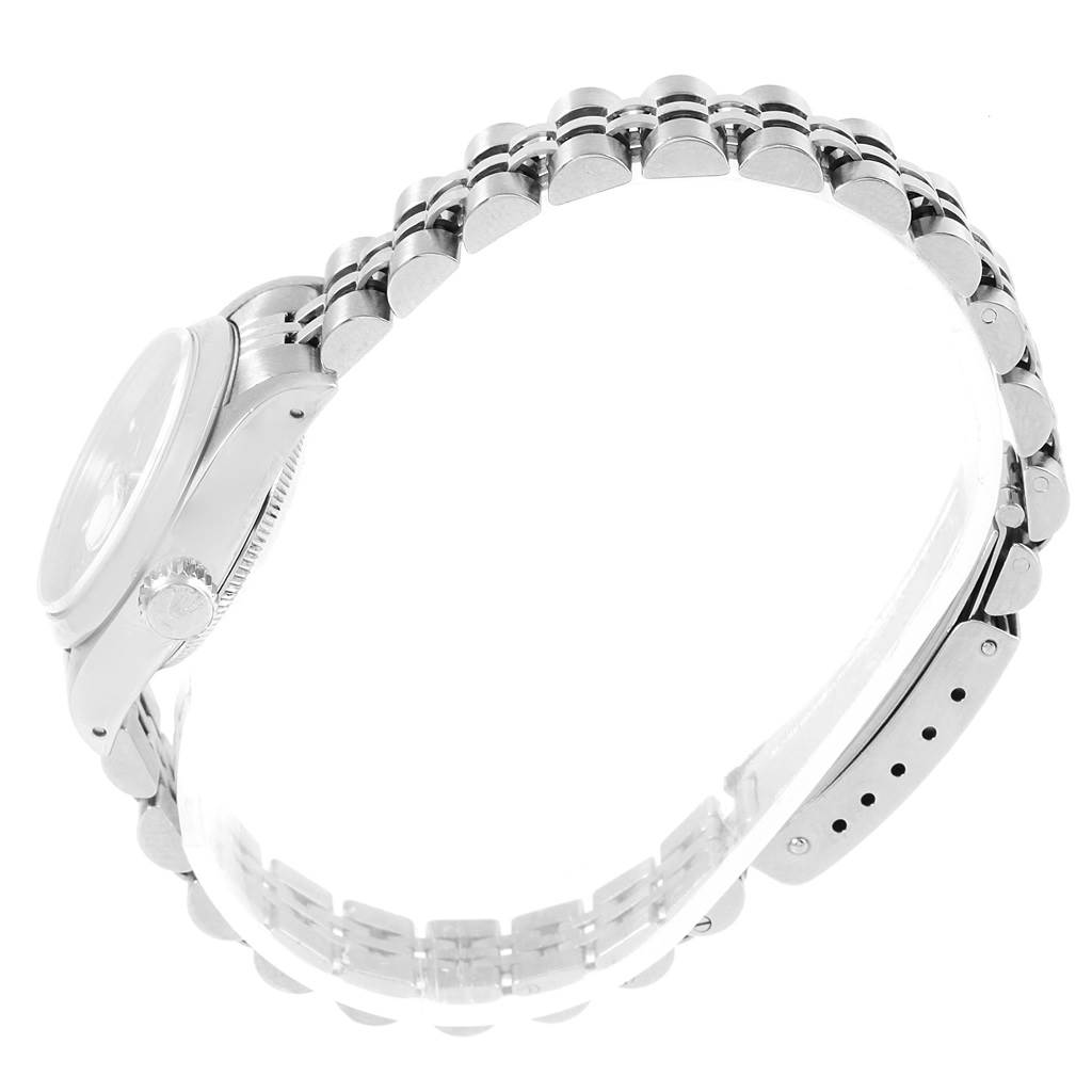 The image shows a side view of the Rolex Date 79160 Women's Stainless Steel Pink Dial 79160 Women's Stainless Steel Pink Dial model watch focusing on the case and metallic bracelet.