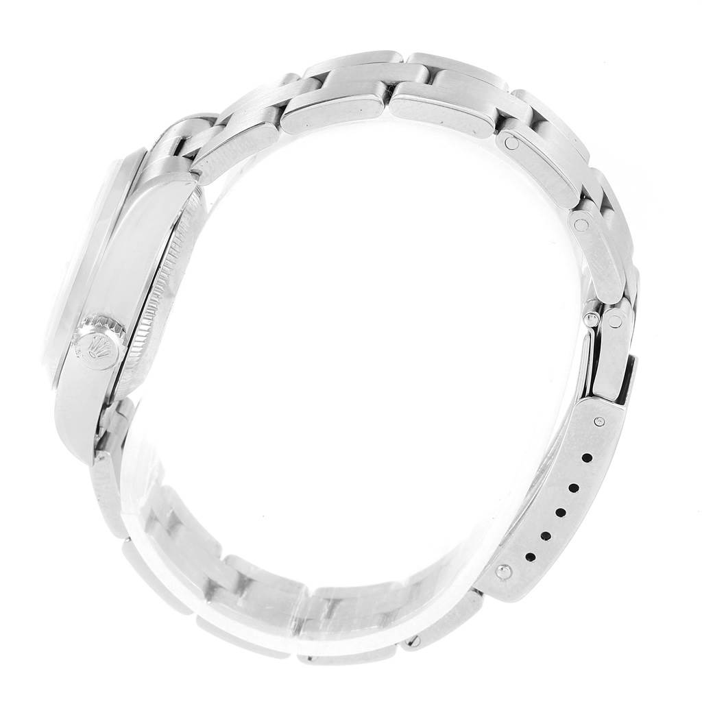 The image shows a side profile of the Rolex Date 79160 Women's Stainless Steel White Dial 79160 Women's Stainless Steel White Dial model watch focusing on the bracelet and case.