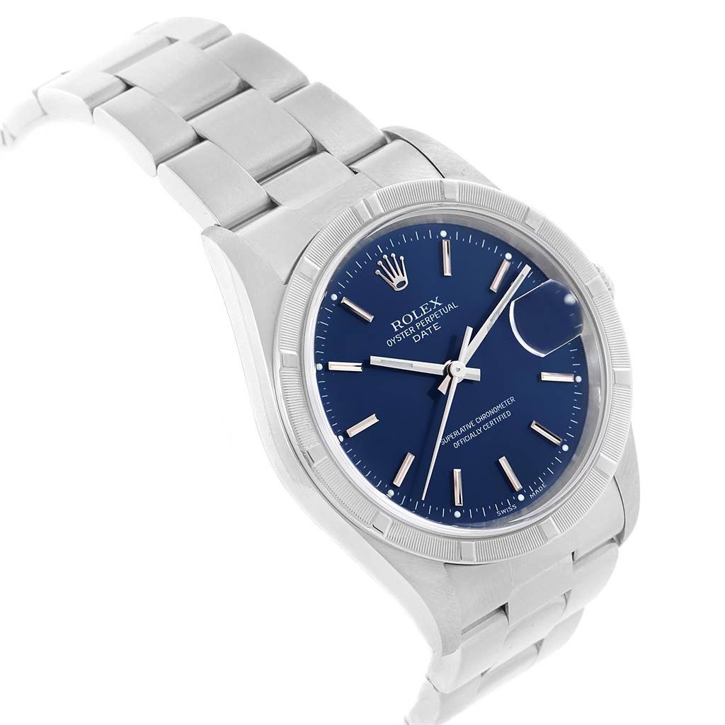 This image shows a Rolex Oyster Perpetual Date watch at a three-quarter angle, displaying the face, bezel, and bracelet.