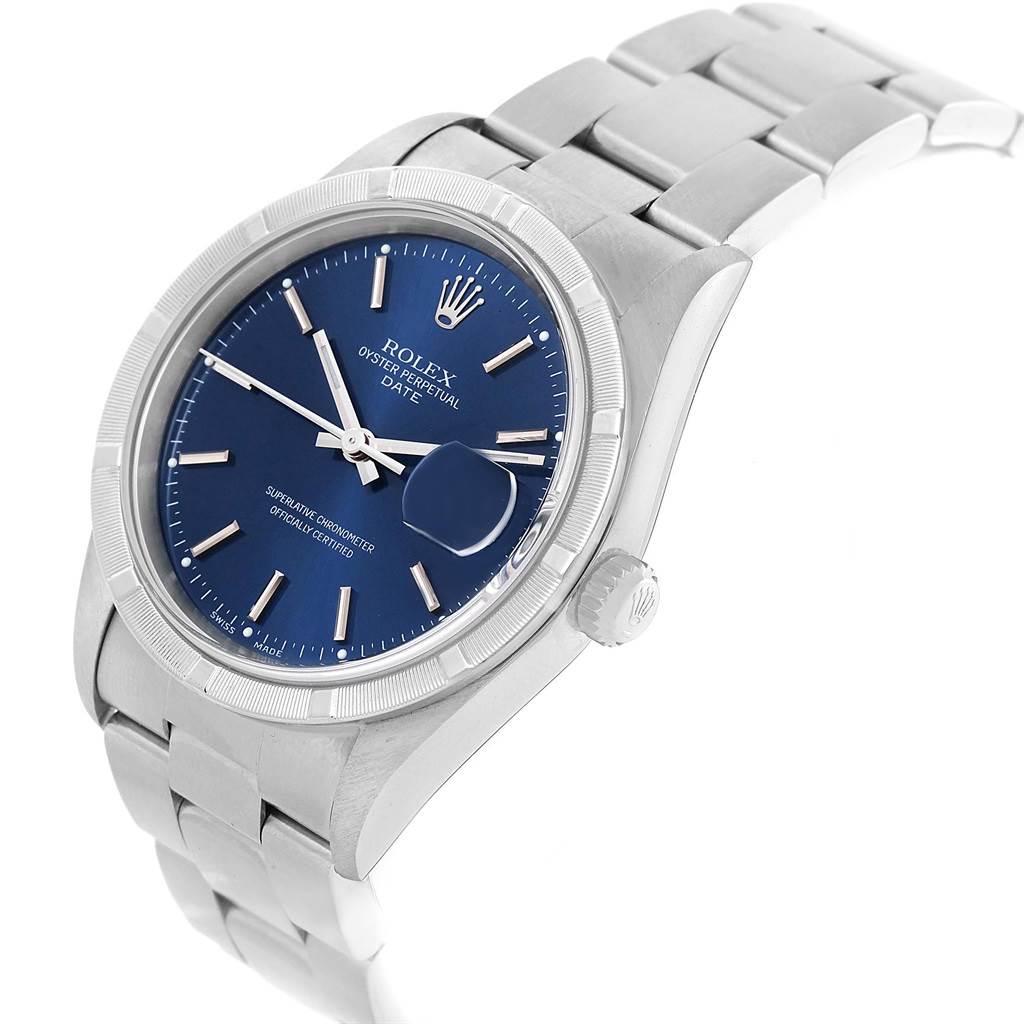The image shows a Rolex Date 15210 Men's Stainless Steel Blue Dial 15210 Men's Stainless Steel Blue Dial model watch at an oblique angle, highlighting the blue dial, the case, and the metal bracelet.