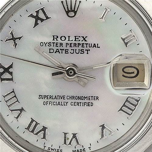 The image shows a close-up of the Rolex Date 6917 Women's Stainless Steel Mother of Pearl Dial 6917 Women's Stainless Steel Mother of Pearl Dialjust watch face, focusing on Roman numerals and a magnified date window at 3 o'clock.