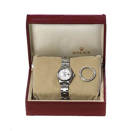The image displays a Rolex Date 6917 Women's Stainless Steel Mother of Pearl Dial 6917 Women's Stainless Steel Mother of Pearl Dial model watch with a linked bracelet and an additional bezel, all within an open display box.