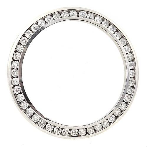 This image shows the bezel of a Rolex Date 6917 Women's Stainless Steel Mother of Pearl Dial 6917 Women's Stainless Steel Mother of Pearl Dial model watch, adorned with diamonds, viewed from the front.