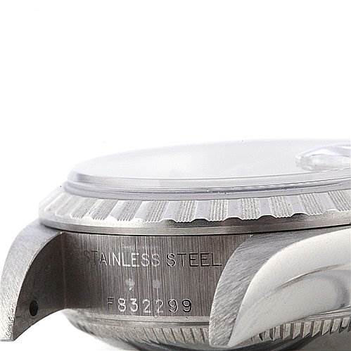 This image shows a close-up side view of the case and bezel of a Rolex Date 79240 Women
s Stainless Steel Silver Dial 79240 Women
s Stainless Steel Silver Dial model watch, emphasizing the stainless steel material.