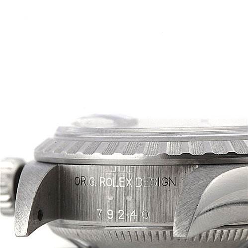 The image shows a side view of the Rolex Date 79240 Women
s Stainless Steel Silver Dial 79240 Women
s Stainless Steel Silver Dial model, highlighting the crown, lug, and the engraved "ORIG. ROLEX DESIGN 79240" on the case.