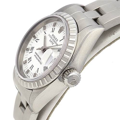 This image shows a side view of a Rolex Date 79240 Women's Stainless Steel White Dial 79240 Women's Stainless Steel White Dial model watch, highlighting the crown, bezel, and part of the bracelet.