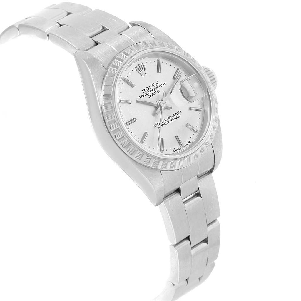 The image shows an angled view of the Rolex Date 79240 Women's Stainless Steel Silver Dial 79240 Women's Stainless Steel Silver Dial model watch, highlighting its dial, bezel, and part of the bracelet.