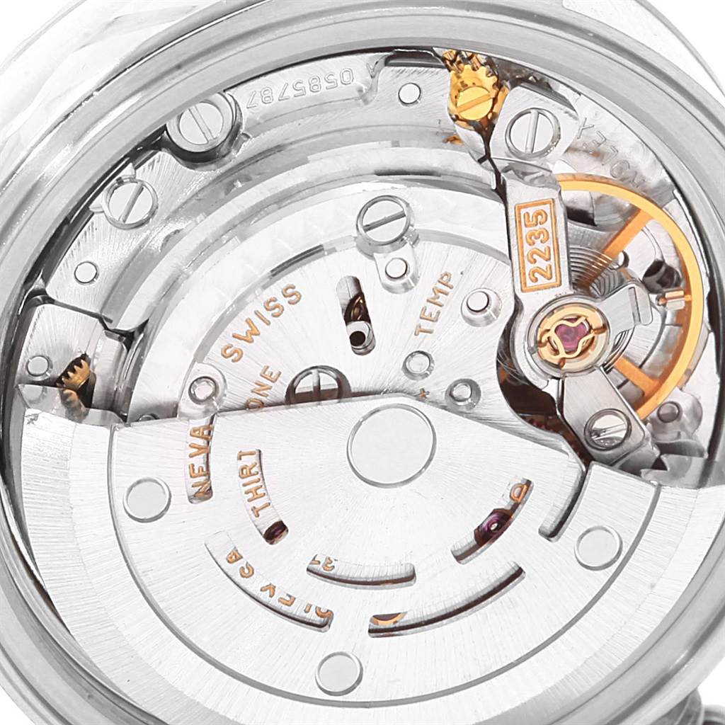 The image shows an underside view of the movement of a Rolex Date 79240 Women's Stainless Steel Silver Dial 79240 Women's Stainless Steel Silver Dial model watch, highlighting its intricate internal components.