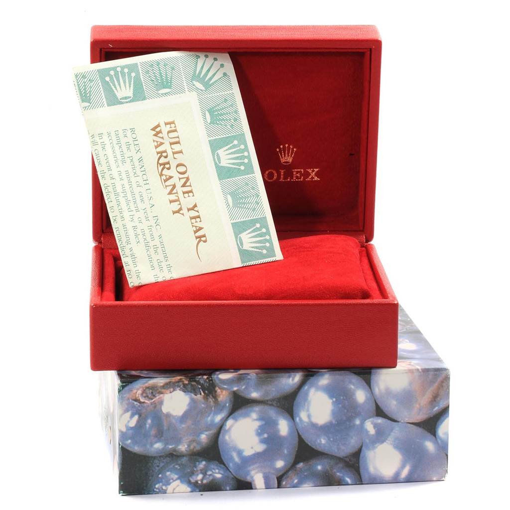 The image shows a Rolex Date 79240 Women's Stainless Steel Silver Dial 79240 Women's Stainless Steel Silver Dial model watch box, including a full one year warranty card, viewed from the front.