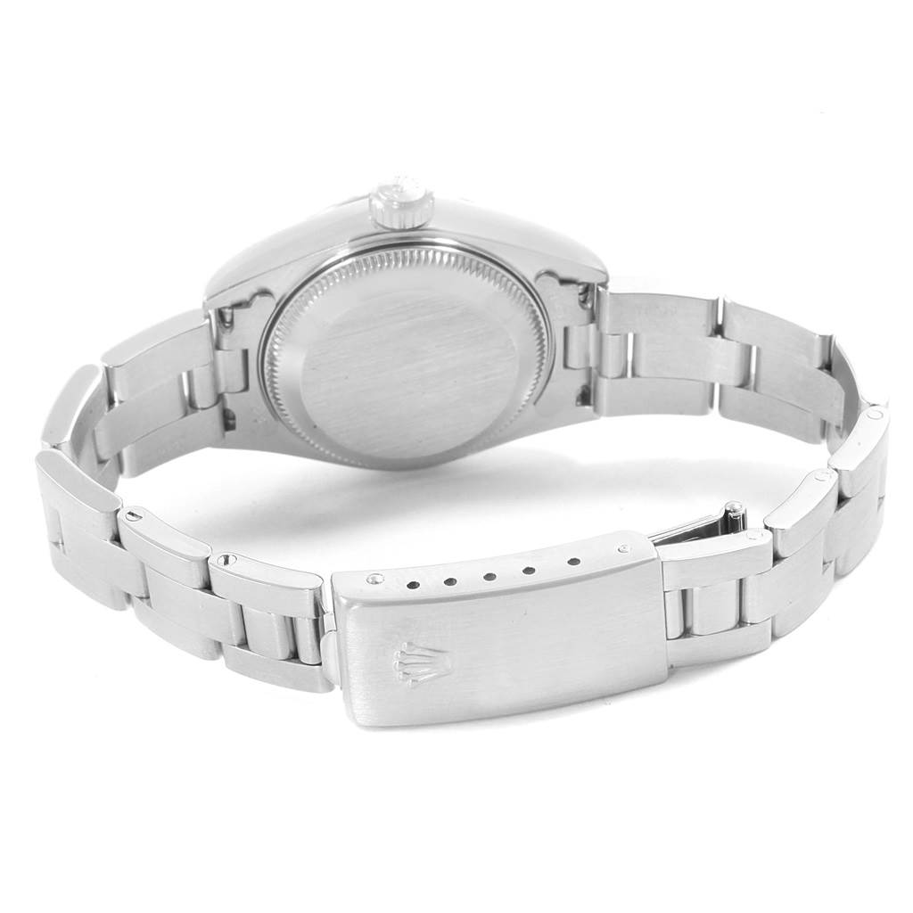 This image shows the back case and bracelet of a Rolex Date 79240 Women's Stainless Steel Silver Dial 79240 Women's Stainless Steel Silver Dial model watch.