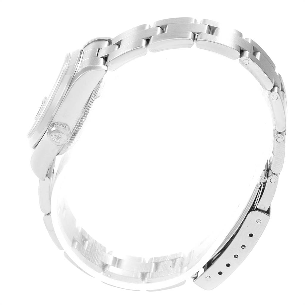 This image shows a side view of the Rolex Date 79160 Women's Stainless Steel Blue Dial 79160 Women's Stainless Steel Blue Dial model watch, highlighting its case, crown, and metal bracelet.