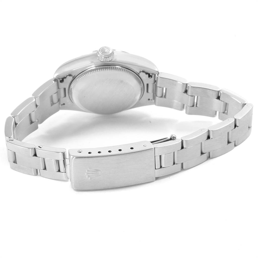 The image shows the back case, crown, and bracelet clasp of a Rolex Date 79160 Women's Stainless Steel Blue Dial 79160 Women's Stainless Steel Blue Dial model watch from a rear angle.