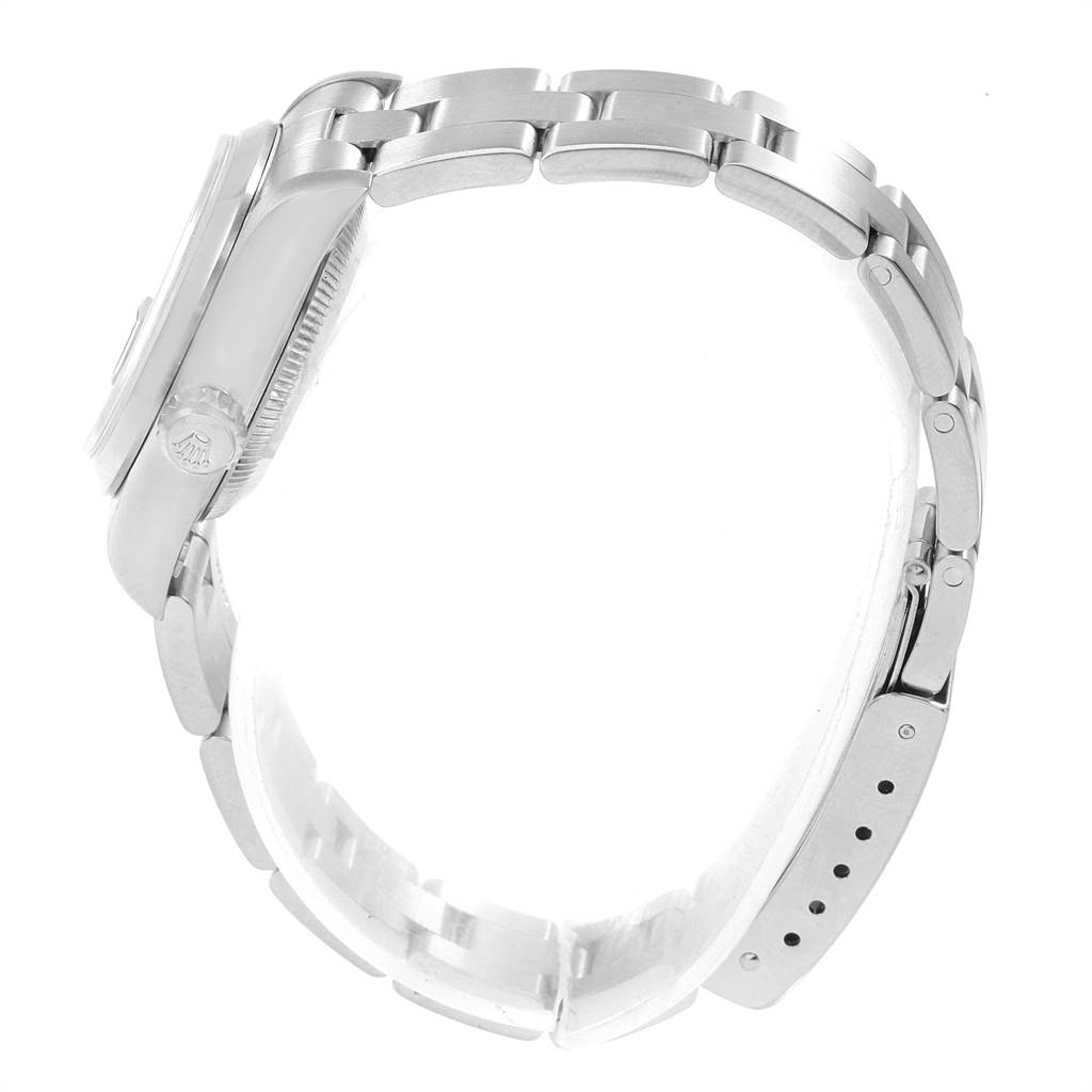 This side view of the Rolex Date 79160 Women
s Stainless Steel Blue Dial 79160 Women
s Stainless Steel Blue Dial model watch showcases its bracelet and crown.