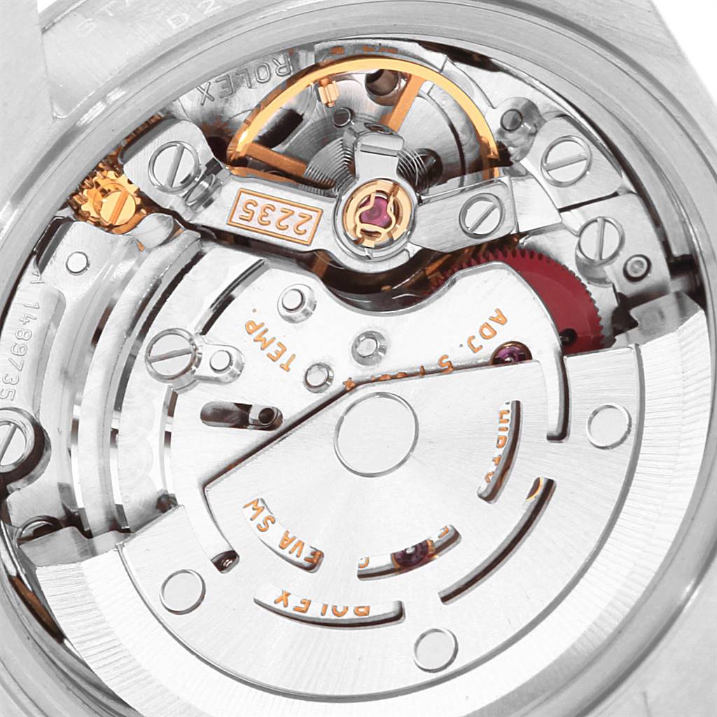 This image shows a close-up of the movement mechanism of a Rolex Date 79160 Women
s Stainless Steel Blue Dial 79160 Women
s Stainless Steel Blue Dial model watch.