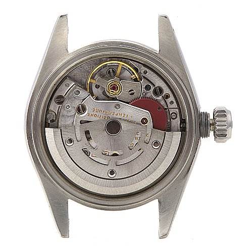 The image shows the back of a Rolex Date 69190 Women's Stainless Steel Blue Dial 69190 Women's Stainless Steel Blue Dial watch case, revealing its intricate internal movement components.